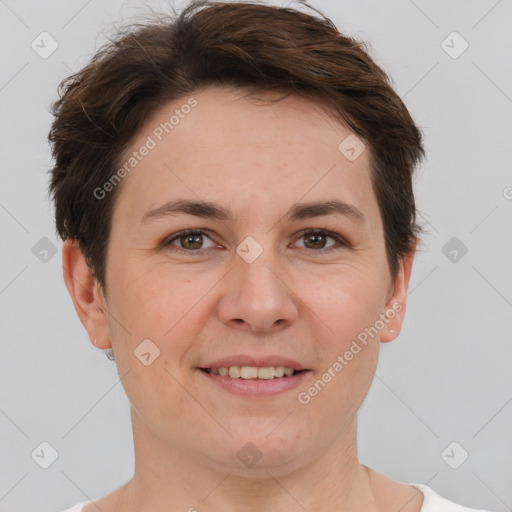 Joyful white adult female with short  brown hair and brown eyes