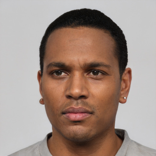 Neutral black young-adult male with short  black hair and brown eyes