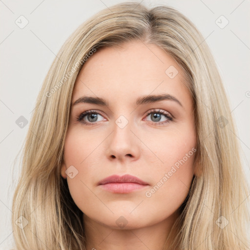 Neutral white young-adult female with long  brown hair and brown eyes