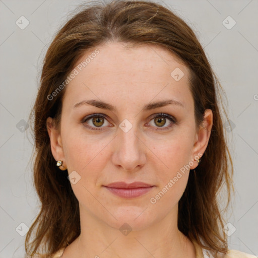 Joyful white young-adult female with medium  brown hair and green eyes