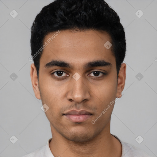 Neutral latino young-adult male with short  black hair and brown eyes