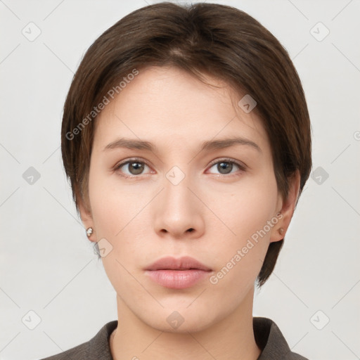 Neutral white young-adult female with short  brown hair and brown eyes