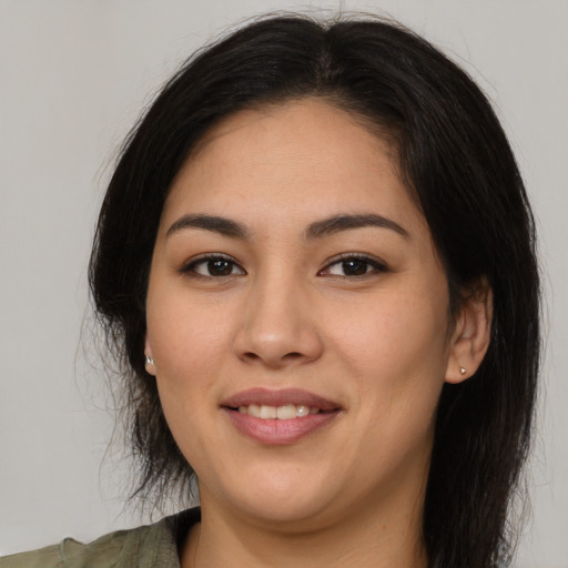 Joyful asian young-adult female with medium  brown hair and brown eyes