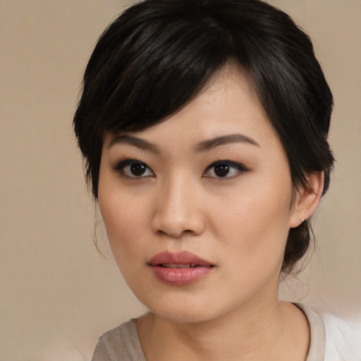 Neutral asian young-adult female with medium  black hair and brown eyes