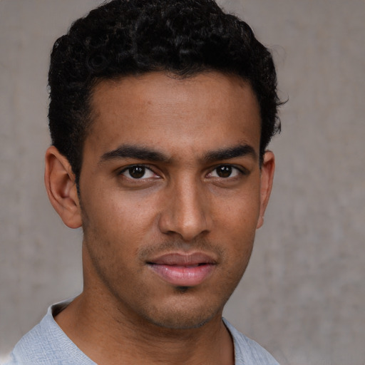 Neutral black young-adult male with short  brown hair and brown eyes