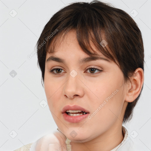 Joyful white young-adult female with medium  brown hair and brown eyes