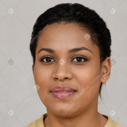 Joyful latino young-adult female with short  brown hair and brown eyes