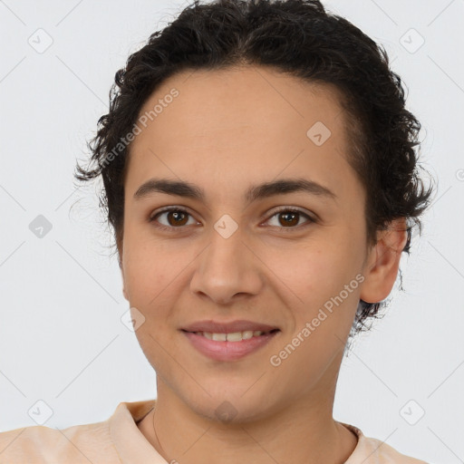 Joyful white young-adult female with short  brown hair and brown eyes