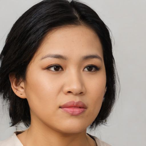 Neutral asian young-adult female with medium  black hair and brown eyes