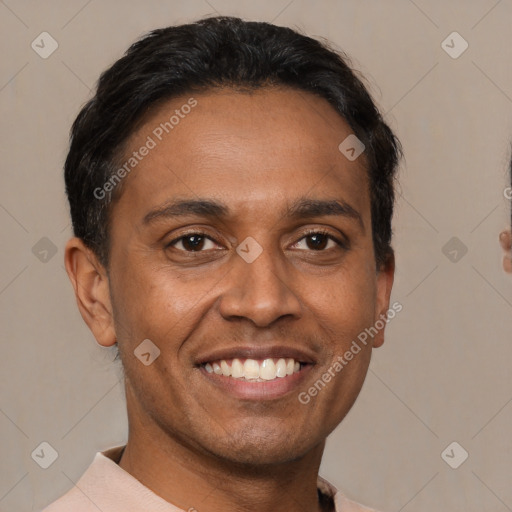 Joyful latino young-adult male with short  black hair and brown eyes