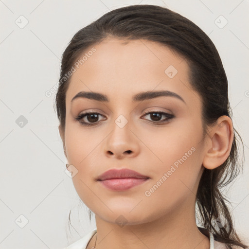 Neutral latino young-adult female with medium  brown hair and brown eyes