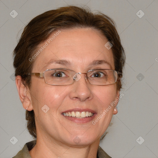 Joyful white adult female with medium  brown hair and blue eyes