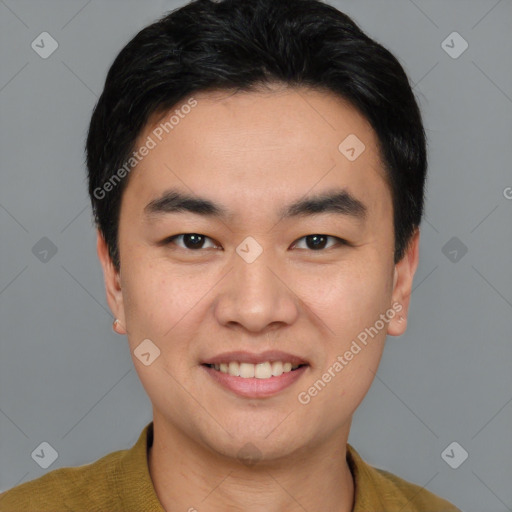 Joyful white young-adult male with short  black hair and brown eyes