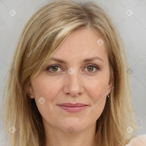 Joyful white adult female with long  brown hair and brown eyes