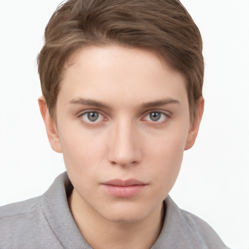 Neutral white young-adult female with short  brown hair and grey eyes