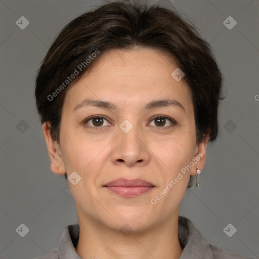 Joyful white adult female with short  brown hair and brown eyes