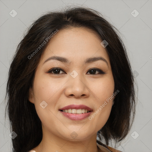 Joyful asian young-adult female with medium  brown hair and brown eyes