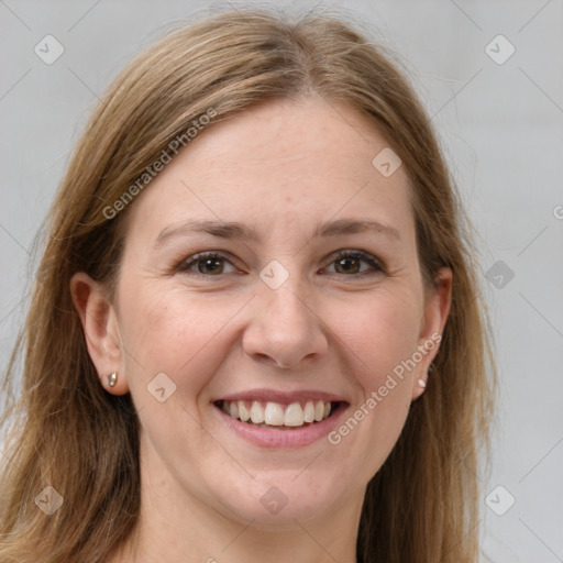 Joyful white young-adult female with long  brown hair and grey eyes