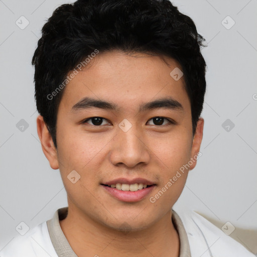 Joyful asian young-adult male with short  black hair and brown eyes