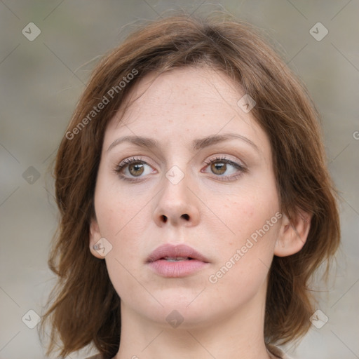 Neutral white young-adult female with medium  brown hair and green eyes