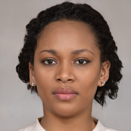 Neutral black young-adult female with short  black hair and brown eyes