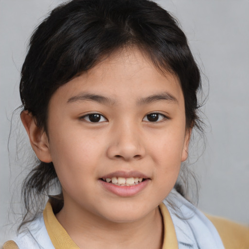 Joyful asian child female with medium  brown hair and brown eyes