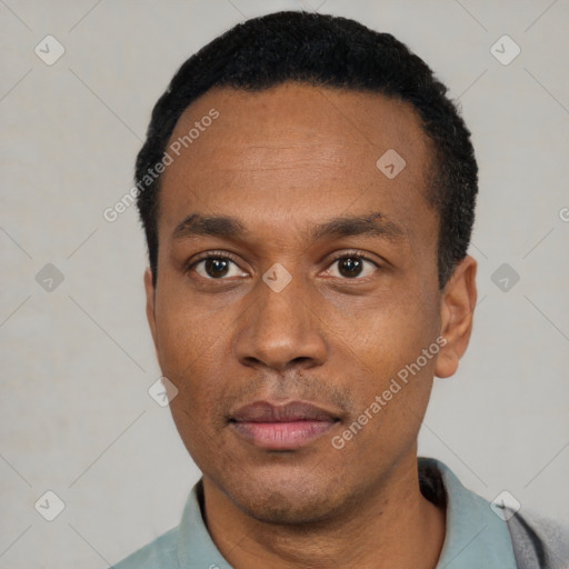 Neutral black young-adult male with short  black hair and brown eyes