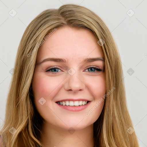 Joyful white young-adult female with long  brown hair and green eyes