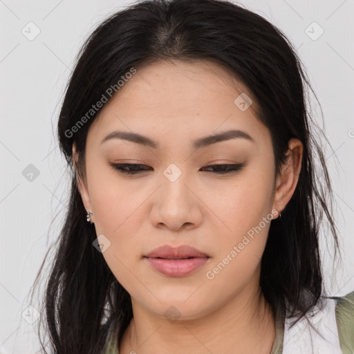 Joyful asian young-adult female with long  brown hair and brown eyes