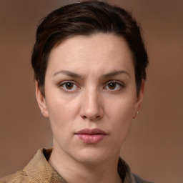 Neutral white young-adult female with short  brown hair and brown eyes