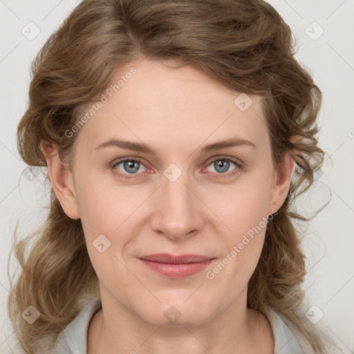 Joyful white young-adult female with medium  brown hair and blue eyes