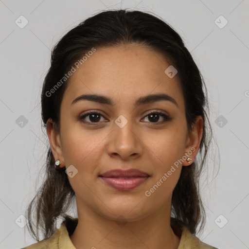 Joyful latino young-adult female with medium  brown hair and brown eyes