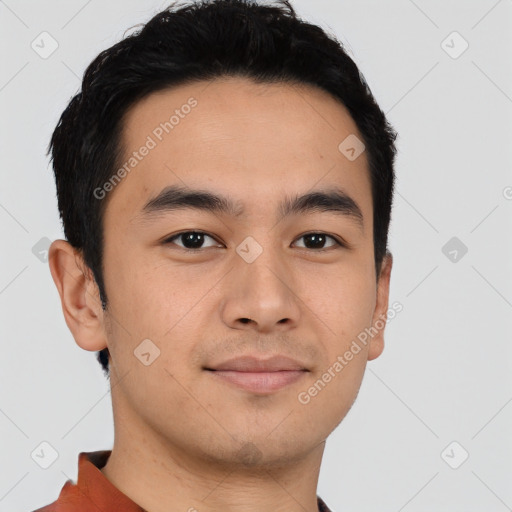 Joyful latino young-adult male with short  brown hair and brown eyes