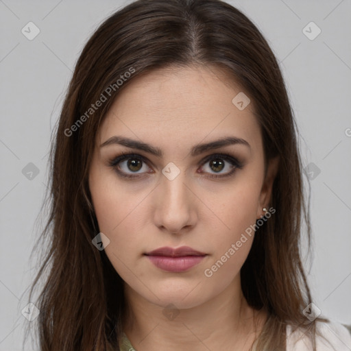 Neutral white young-adult female with long  brown hair and brown eyes