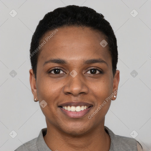 Joyful black young-adult female with short  black hair and brown eyes