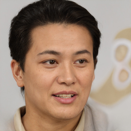 Joyful white adult female with short  brown hair and brown eyes