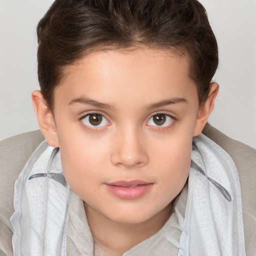 Joyful white child female with short  brown hair and brown eyes