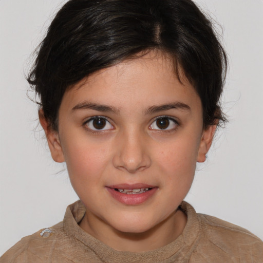 Joyful white child female with short  brown hair and brown eyes