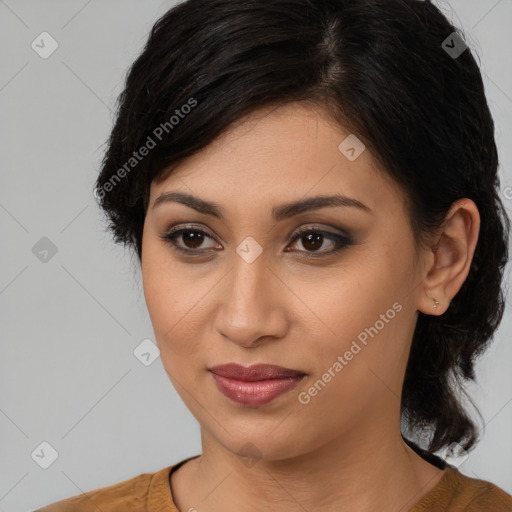 Joyful latino young-adult female with medium  black hair and brown eyes