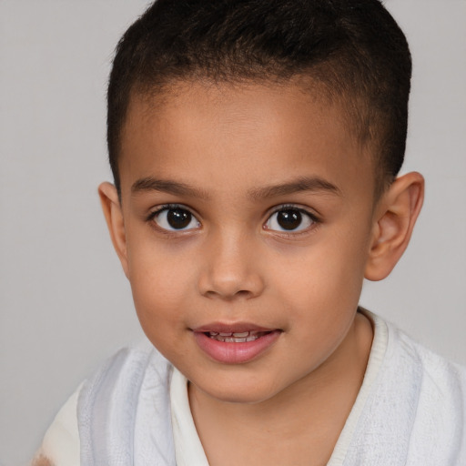 Joyful white child female with short  brown hair and brown eyes