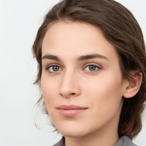 Neutral white young-adult female with medium  brown hair and grey eyes