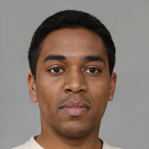 Neutral black young-adult male with short  black hair and brown eyes