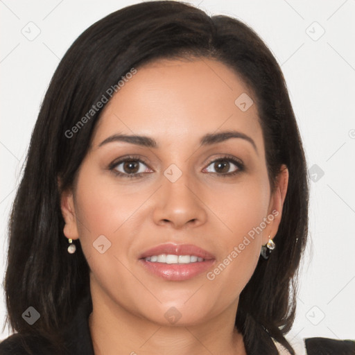 Joyful latino young-adult female with long  brown hair and brown eyes