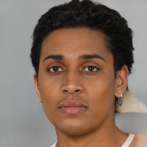 Neutral black young-adult female with short  brown hair and brown eyes