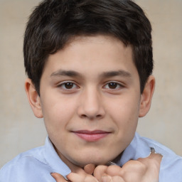 Joyful white child male with short  brown hair and brown eyes