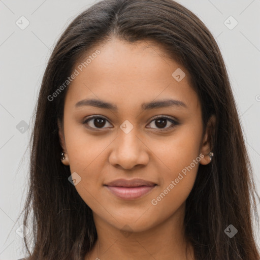 Joyful latino young-adult female with long  brown hair and brown eyes