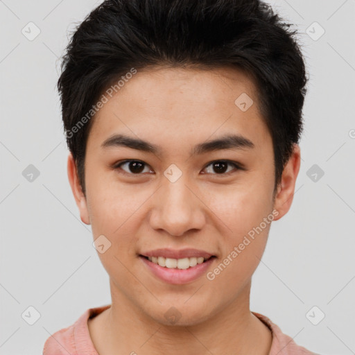 Joyful asian young-adult male with short  brown hair and brown eyes