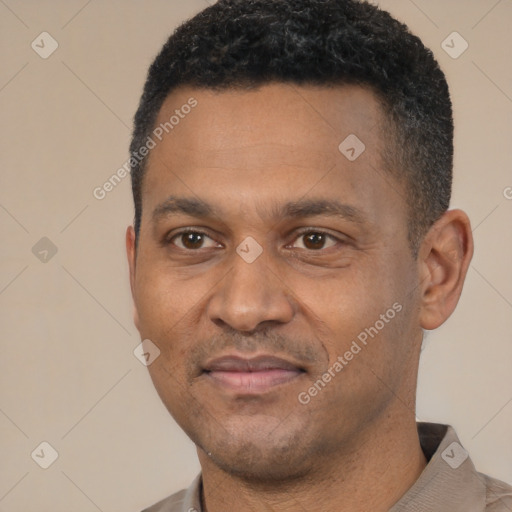 Joyful latino adult male with short  black hair and brown eyes