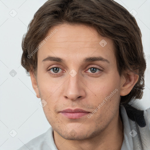 Joyful white adult male with short  brown hair and grey eyes