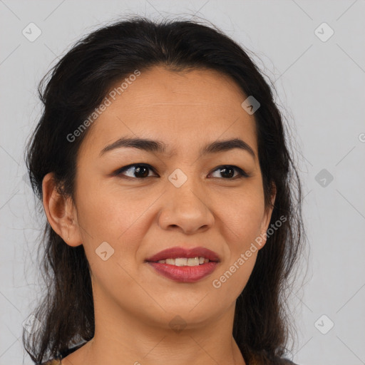 Joyful latino young-adult female with medium  brown hair and brown eyes